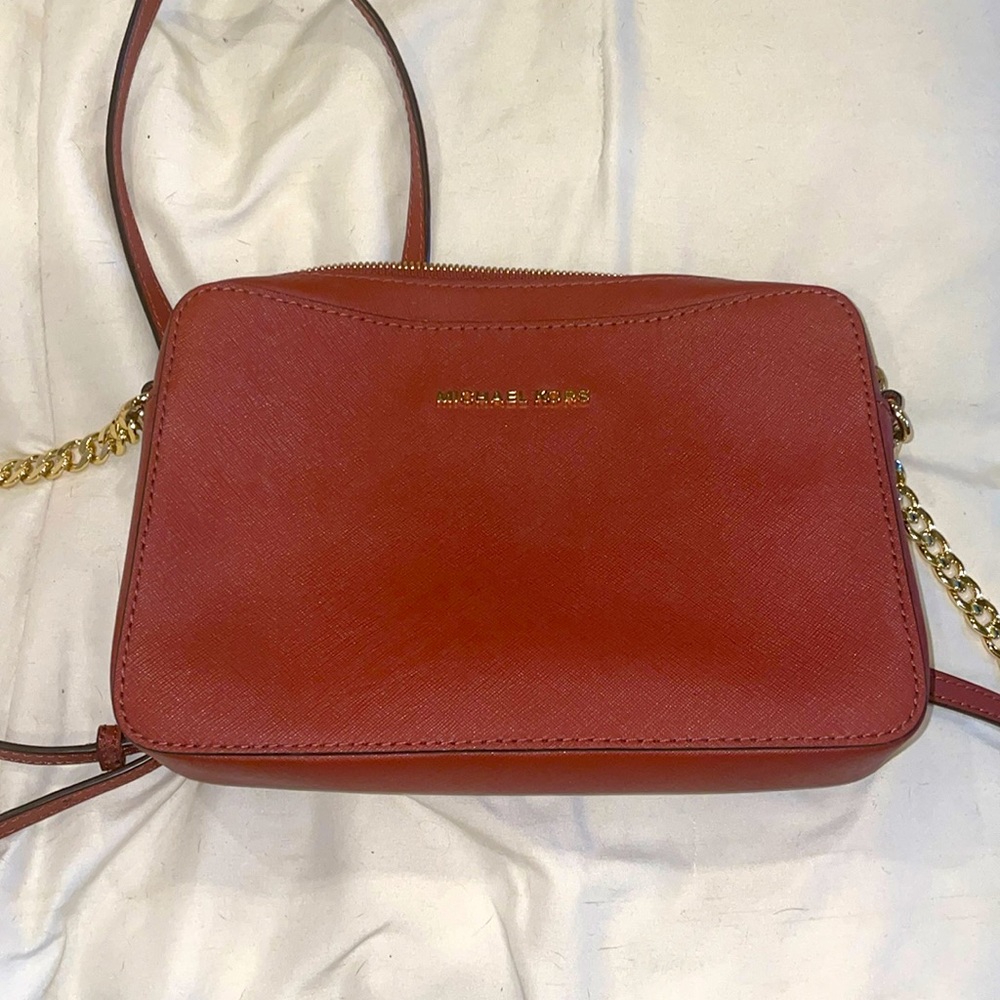 Michael Kors brick red crossbody style bag. Jet set name of bag. So pretty!